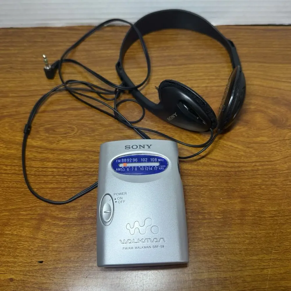 Sony Walkman FM/AM Radio SRF-59 Silver Gray W/ Belt Clip Used Working Tested